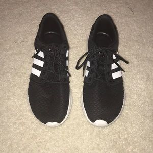 Black adidas cloud foam tennis shoes